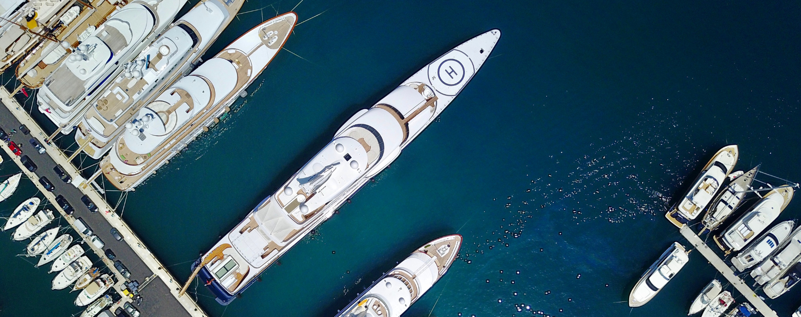 fleet of boats on blue water