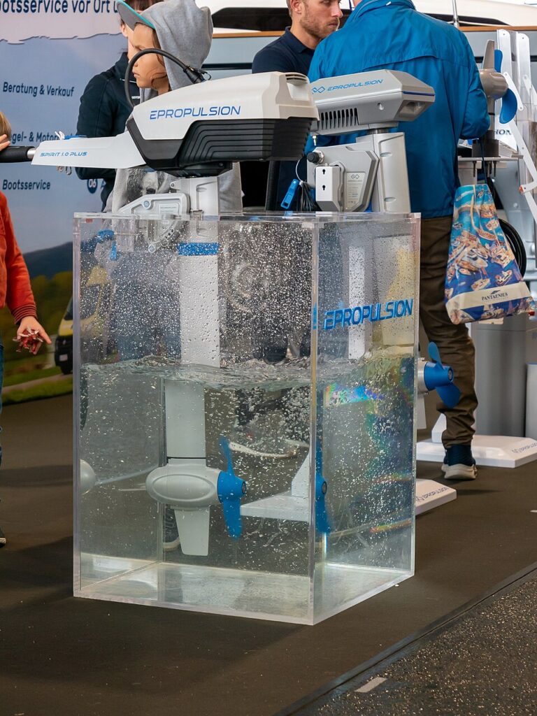 Electric outboards displayed at a marine trade show